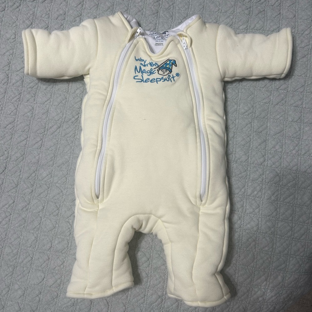 Very lightly worn baby Merlin magic sleep suit yellow